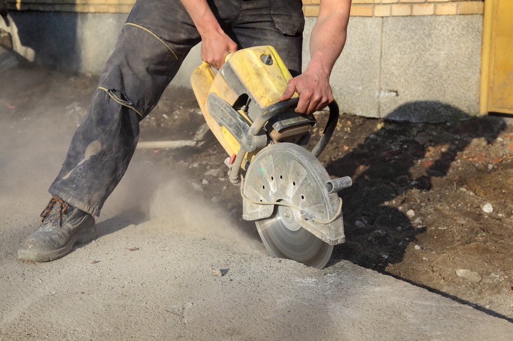 Asphalt,Or,Concrete,Cutting,With,Saw,Blade,At,Construction,Site